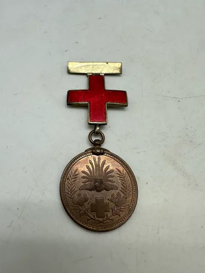 Japan: Red Cross medal for the Russo Japanese War 1904-5 bronze with large enamelled red cross suspension for Medical staff