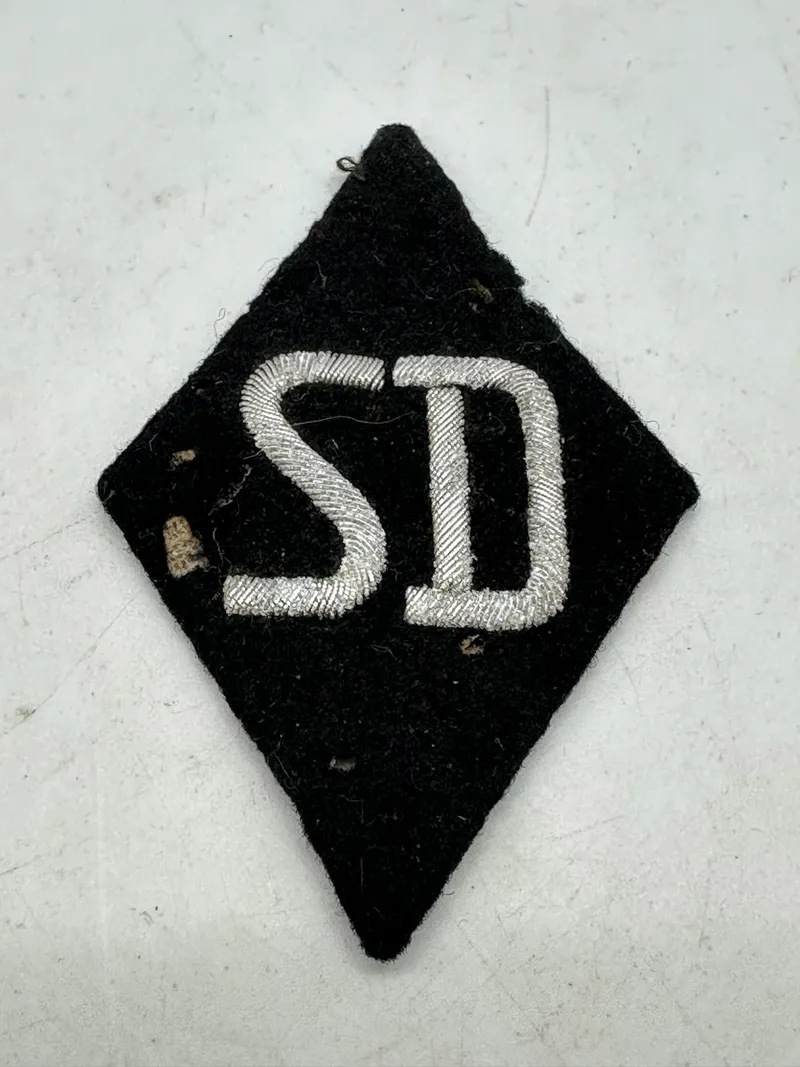 Original RARE SD ‘Sicherheitsdienst’ sleeve diamond for officers with RZM tag