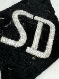 Original RARE SD ‘Sicherheitsdienst’ sleeve diamond for officers with RZM tag