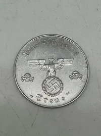 Original SS Token for SS Winter Relief in the amount of 1 Schilling. "MEINE EHRE TREUE HEISST" with SS runes  1 SCHILLING.
