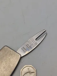 Golf ting og Zippo målebånd