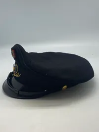 Original brand kasket med bolcheknap