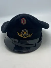 Original brand kasket med bolcheknap