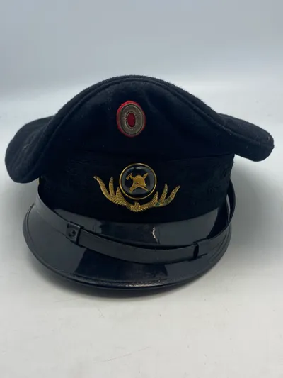 Original brand kasket med bolcheknap