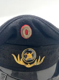 Original brand kasket med bolcheknap