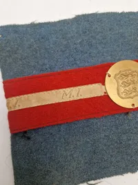 Originalt armbind fra den danske modstandsbevægelse (MI)