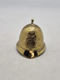 Miniature hjelm ( klokke ) fra det britiske politi