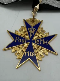 The Pour le Mérite (German: [puːɐ̯ lə meˈʁiːt];[3] French: [puʁ lə me.ʁit], lit. 'For Merit'), also informally known as the Blue Max, repro
