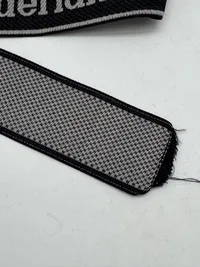 Original  Waffen-SS "Nederland" EM/NCO cuff title-Machine-woven (Bevo). EM/NCO type. Worn by members of the 23. SS-Freiwilligen-Panzergrenadier-Division „Nederland“ (niederländische Nr. 1)