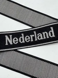 Original  Waffen-SS "Nederland" EM/NCO cuff title-Machine-woven (Bevo). EM/NCO type. Worn by members of the 23. SS-Freiwilligen-Panzergrenadier-Division „Nederland“ (niederländische Nr. 1)