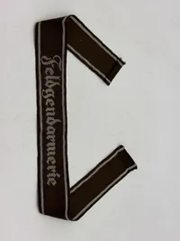 Original ARMY SLEEVE BAND “FELDGENDARMERIE” Machine-woven. Bevo type, em/nco