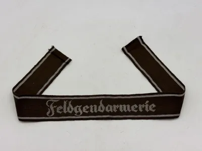Original ARMY SLEEVE BAND “FELDGENDARMERIE” Machine-woven. Bevo type, em/nco