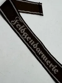 Original ARMY SLEEVE BAND “FELDGENDARMERIE” Machine-woven. Bevo type, em/nco