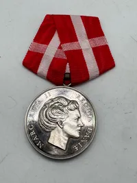 Fortjenstmedaljen i sølv Tildelt : Knud Elvin Knudsen, vægt 43 gram