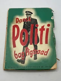 Dansk politi bag pigtraad