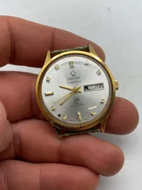 Orfima Automatic Golden flame ur - ure som dette går for mellem 3000-5000,- på EBay