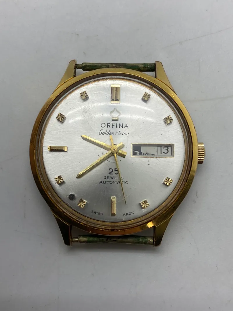 Orfima Automatic Golden flame ur - ure som dette går for mellem 3000-5000,- på EBay