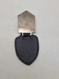 Originale lommeskjolde til uniformen