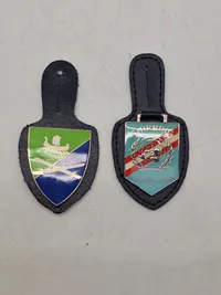 Originale lommeskjolde til uniformen
