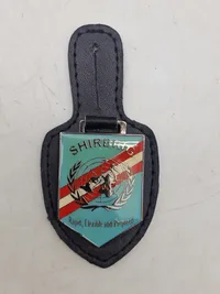 Originale lommeskjolde til uniformen