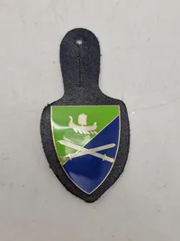 Originale lommeskjolde til uniformen