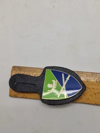 Originale lommeskjolde til uniformen