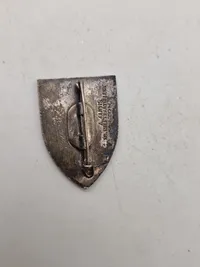 Samling diverse militære medaljer, vinger mm.