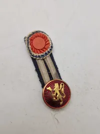 Samling diverse militære medaljer, vinger mm.