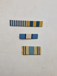 Samling diverse militære medaljer, vinger mm.