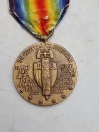 Original ww1 Victory Medal med massere af spændende ribbon bars 1 divsion