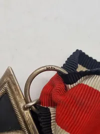 Original 1939 Iron Cross 2nd Class - 26  Three-part construction. Original black paint. Iron core. "26" maker marked to the ring (B.H. Mayer, Pforzheim)