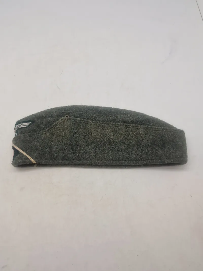 Tysk WWII skråhue M1938 for infanteri, størrelse ca. 56 - efterkrigs