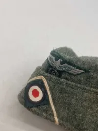 Tysk WWII skråhue M1938 for infanteri, størrelse ca. 56 - efterkrigs