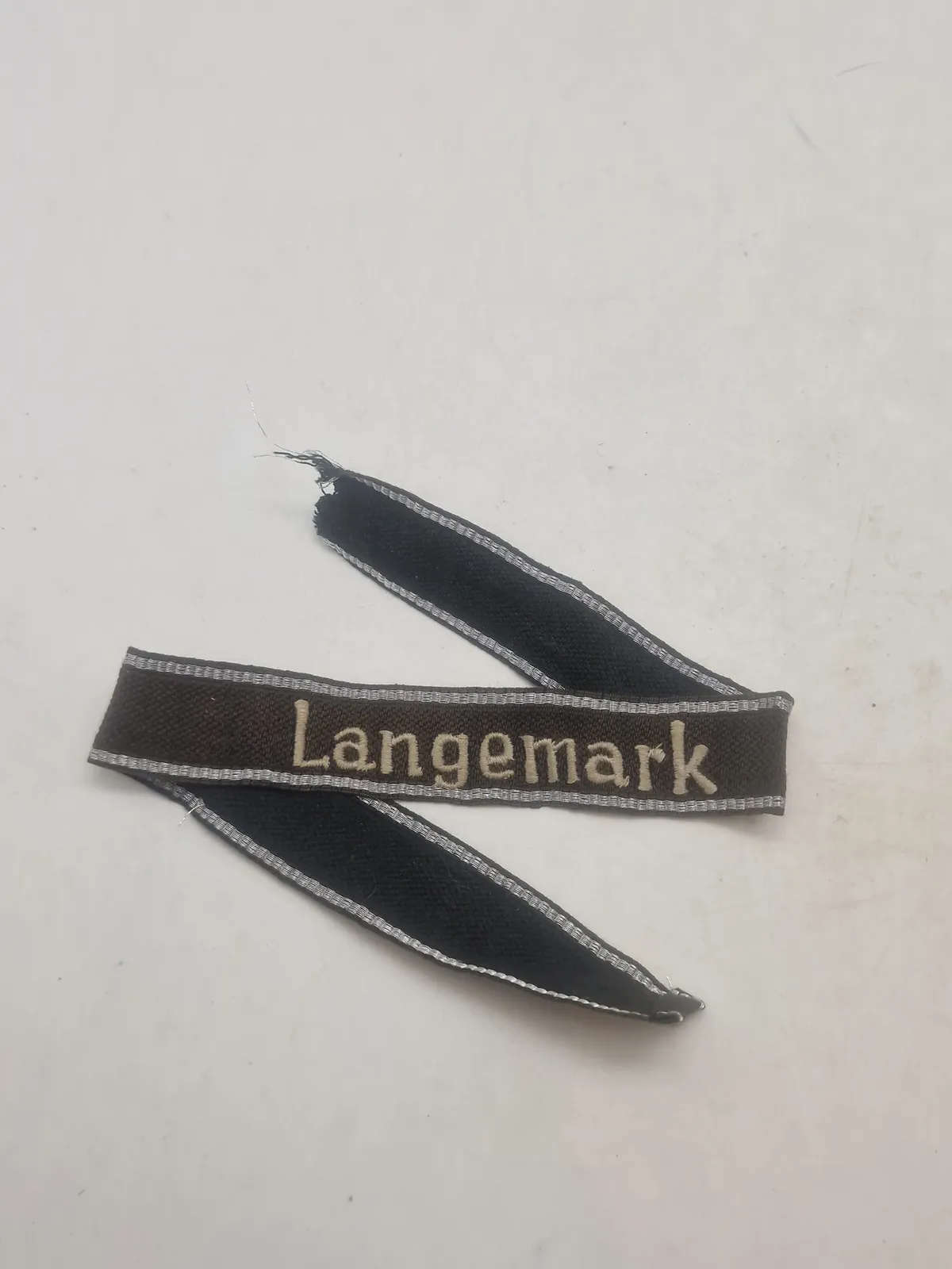 Tysk WWII - SS-ærmestribe fra 27. SS-Freiwilligen-Grenadier-Division Langemark - efterkrigs