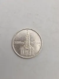 Tyske sølv mønter: 2 RM fra 1934 og 5 RM fra 1935, efter nazisterne havde fået magten i Tyskland, men inden der kom hagekors på alle mønter