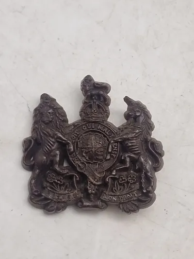 Originalt  senkrigs bakelit mærke fra British Army General Service Corps (GSC).