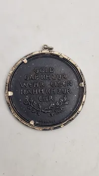 Original tysk medalje fra Første Verdenskrig, kendt som "In Eiserner Zeit 1916" (I Jerntiden 1916).