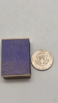 Original Kennedy Half Dollar, en halvdollar-mønt udstedt af United States Mint