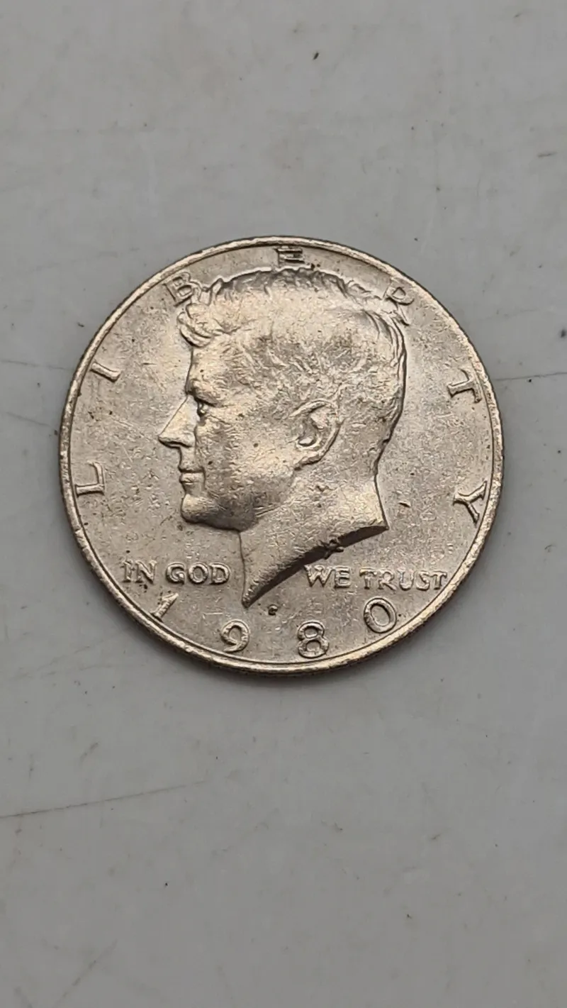 Original Kennedy Half Dollar, en halvdollar-mønt udstedt af United States Mint