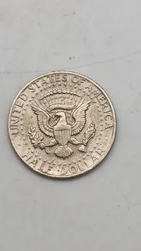 Original Kennedy Half Dollar, en halvdollar-mønt udstedt af United States Mint