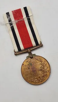 Original Special Constabulary Long Service Medal, en medalje tildelt i Storbritannien til medlemmer af Special Constabulary for lang og fortjenstfuld tjeneste - Navngiven