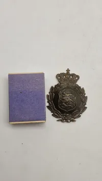 Originalt M/23 hjelmmærke