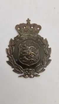 Originalt M/23 hjelmmærke