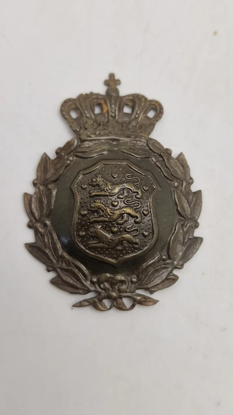 Originalt M/23 hjelmmærke