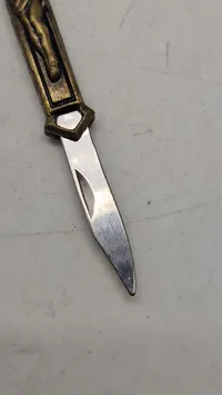 Kors med lommekniv i enden (nøglering)
