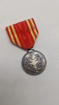 Original medalje fra Manchukuo Røde Kors Selskab, som blev oprettet i 1938 under den japanske besættelse af Manchuriet.