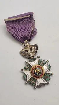 Original belgiske Leopoldorden, som er den ældste og mest prestigefyldte af de tre nationale belgiske ridderordener.
