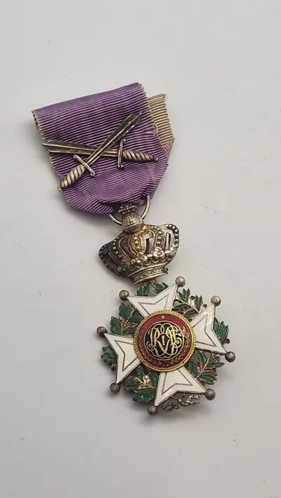 Original belgiske Leopoldorden, som er den ældste og mest prestigefyldte af de tre nationale belgiske ridderordener.