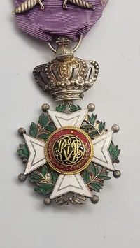 Original belgiske Leopoldorden, som er den ældste og mest prestigefyldte af de tre nationale belgiske ridderordener.