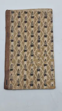 Original “Skudsmaalsbog for Mandfolk" fra 1838. En skudsmålsbog var en obligatorisk kontrolbog for tjenestefolk (også kaldet tyende) i Danmark fra 1833 til 1921.